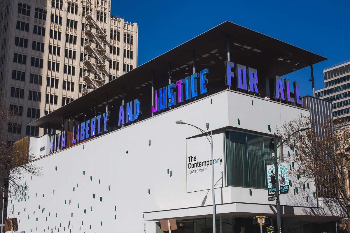 The Contemporary Austin displaying large lettering that states Liberty and Justice for all on the upper deck