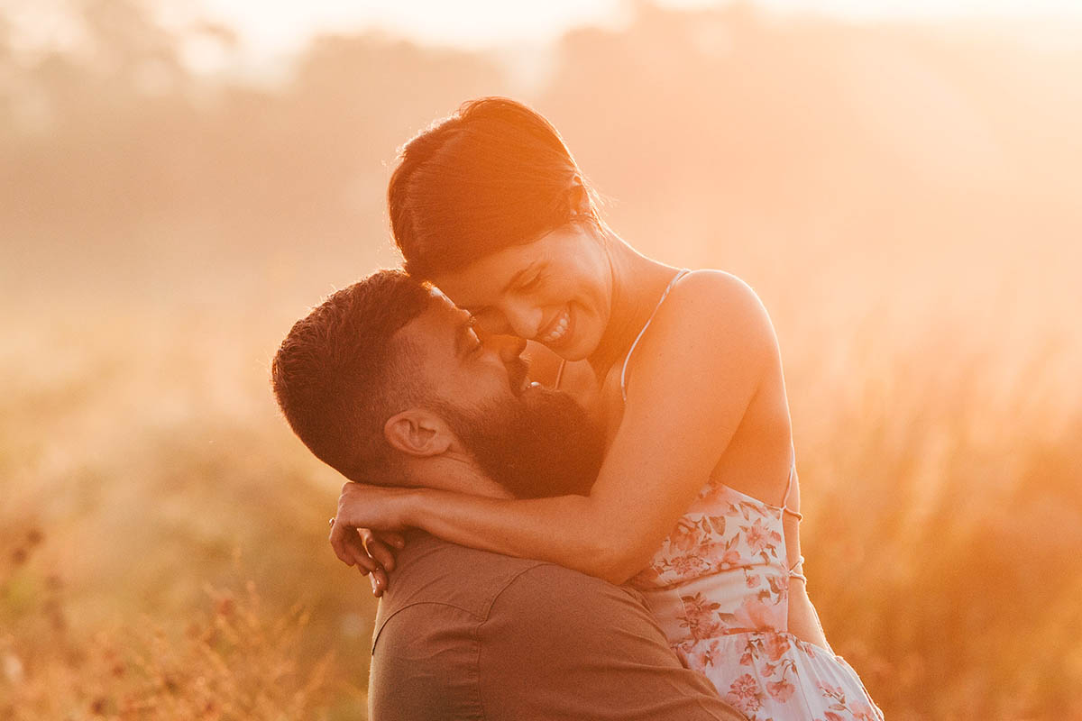 engaged couple hazy sunrise commons ford park engagement photography