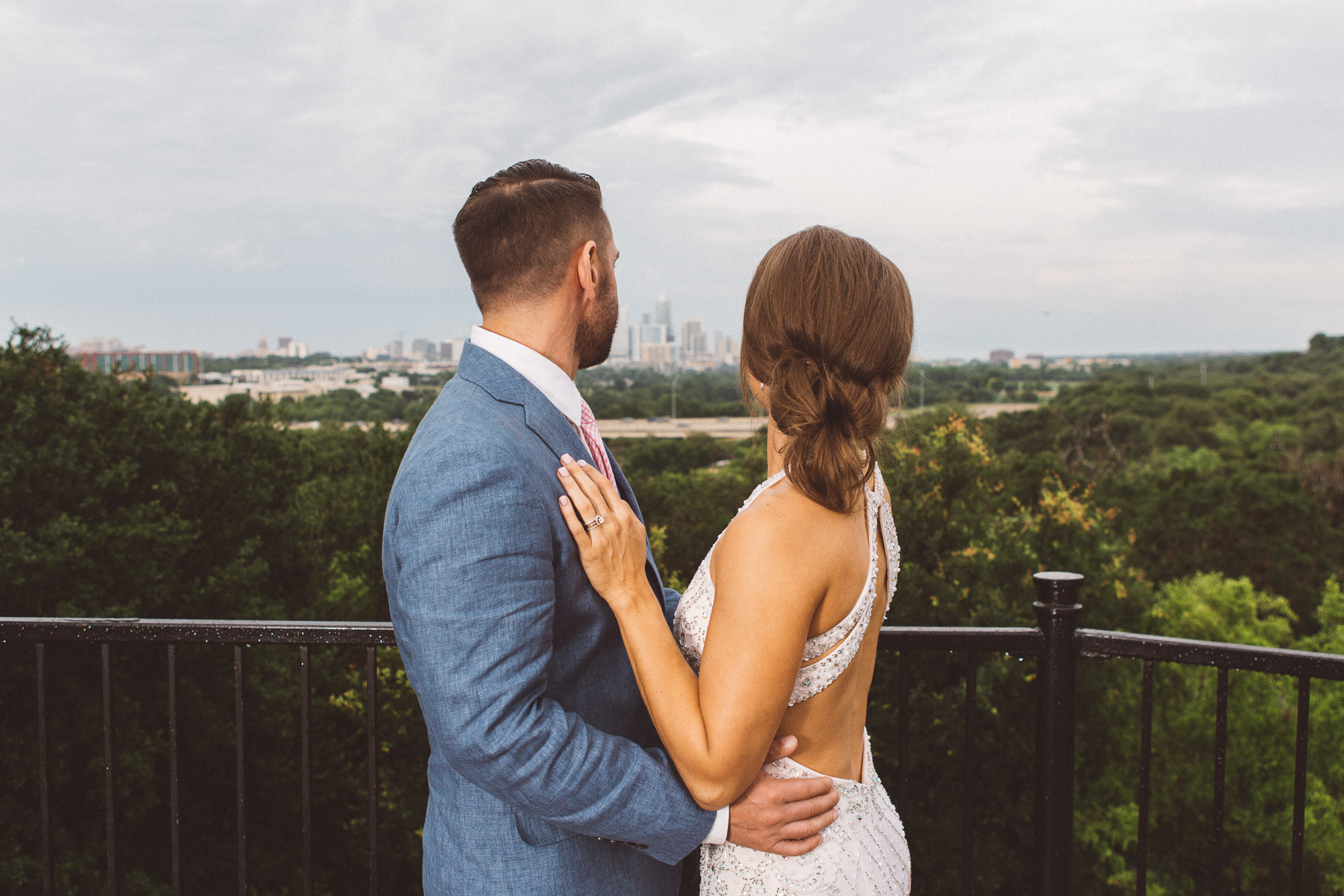 austin texas wedding zilker park clubhouse photographer portraits bride groom kiss pink tie blue suit dapper