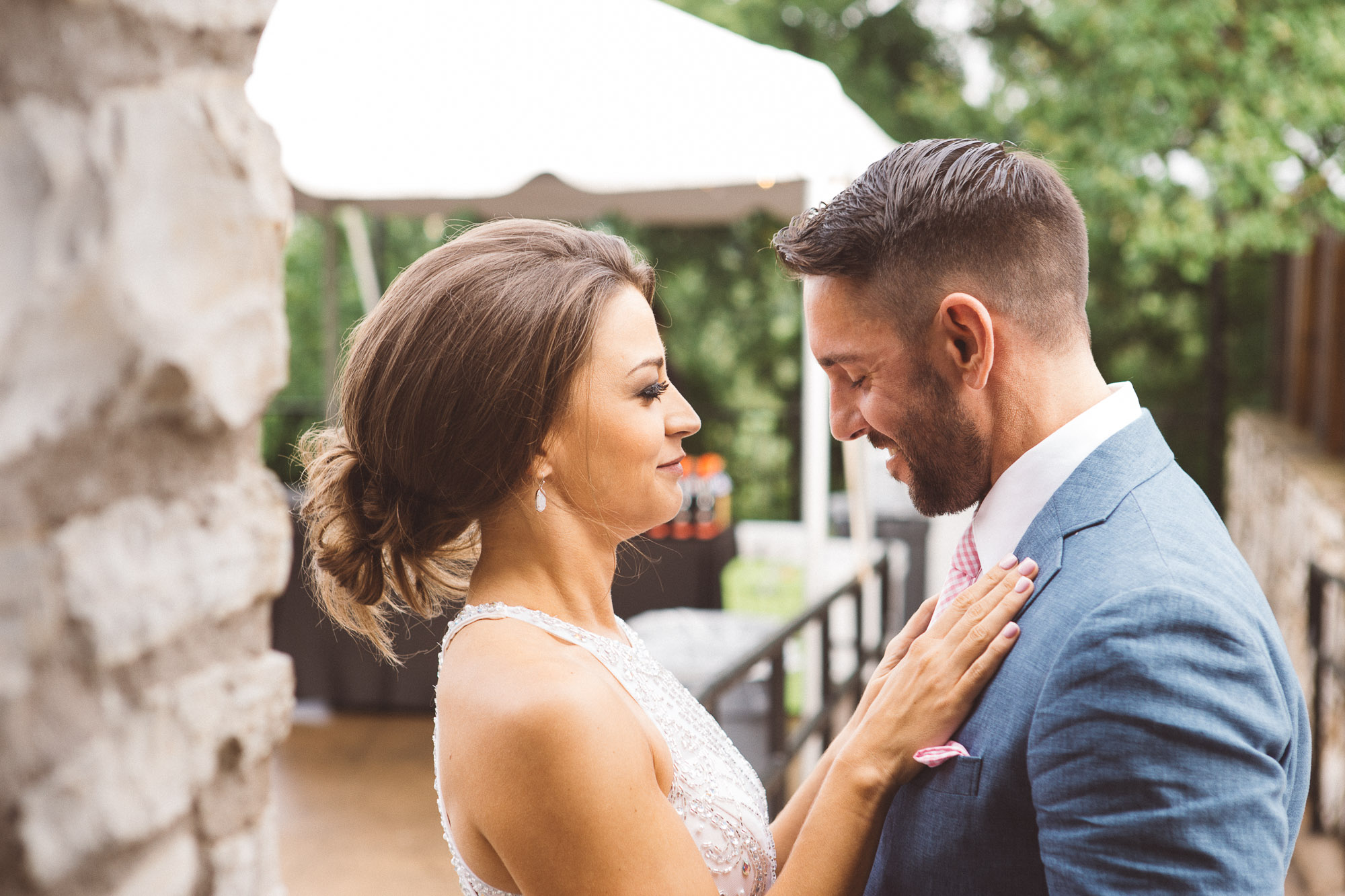 zilker park clubhouse austin texas wedding photographer portraits bride smiling admiring groom mirin happy joy pink tie blue suit dapper